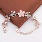 Buy YouBella Jewellery Bracelets for Women Stylish Rose Gold Plated Crystal Bracelet Bangle Jewellery for Girls and Women (Floral) - Image 2